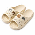 Claquettes 36/37 en EVA beige à motifs animaux semelle texturée